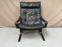 vends fauteuil design cuir noir retro style vintage à Paris